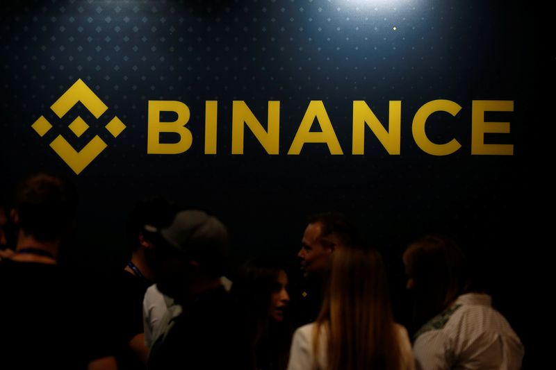 The logo of Binance is seen on their exhibition stand