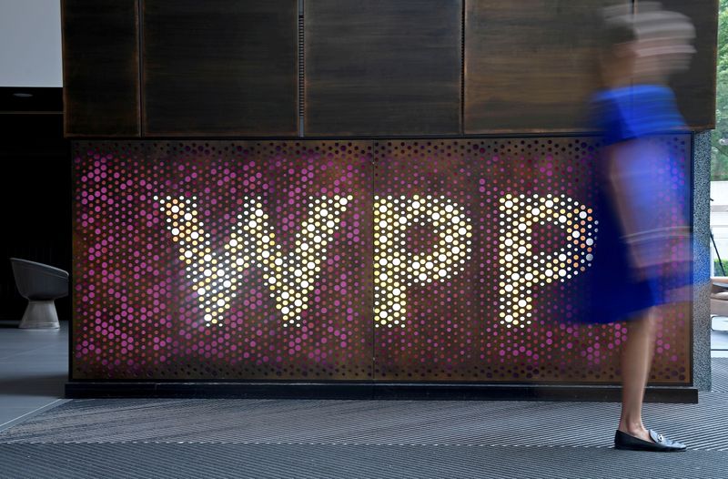 FILE PHOTO: Branding signage is seen for WPP, the world’s