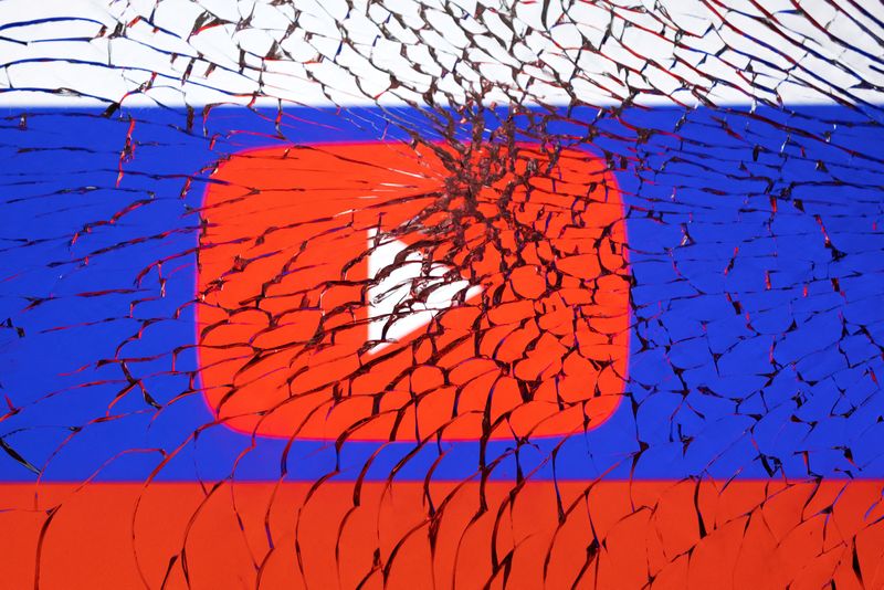 FILE PHOTO: Illustration shows Youtube logo and Russian flag through