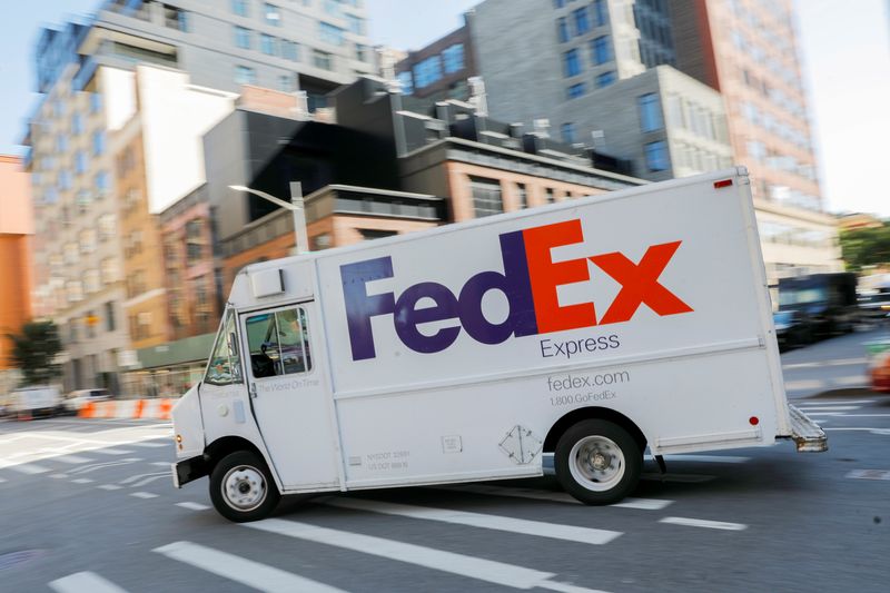 FILE PHOTO: A FedEx vehicle is driven in Manhattan, New