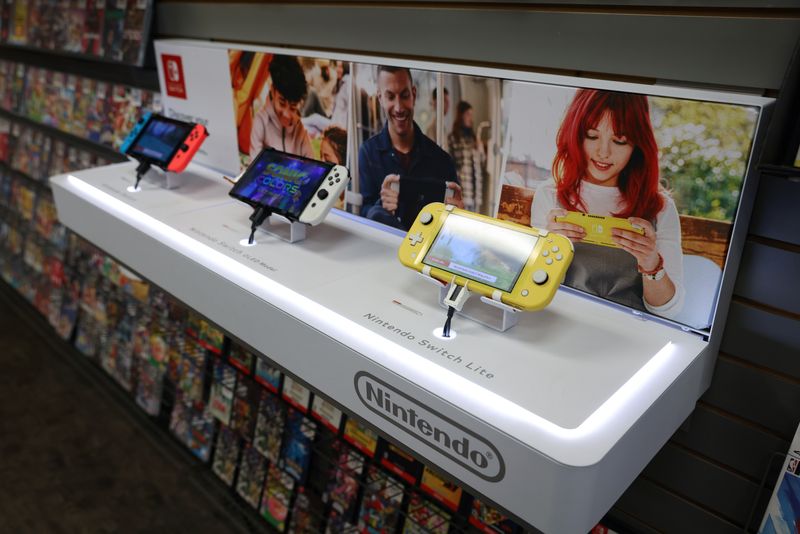 Different models of the Nintendo Switch are seen on display