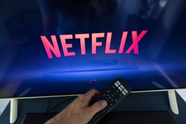 FILE PHOTO: A Netflix logo is shown on a TV