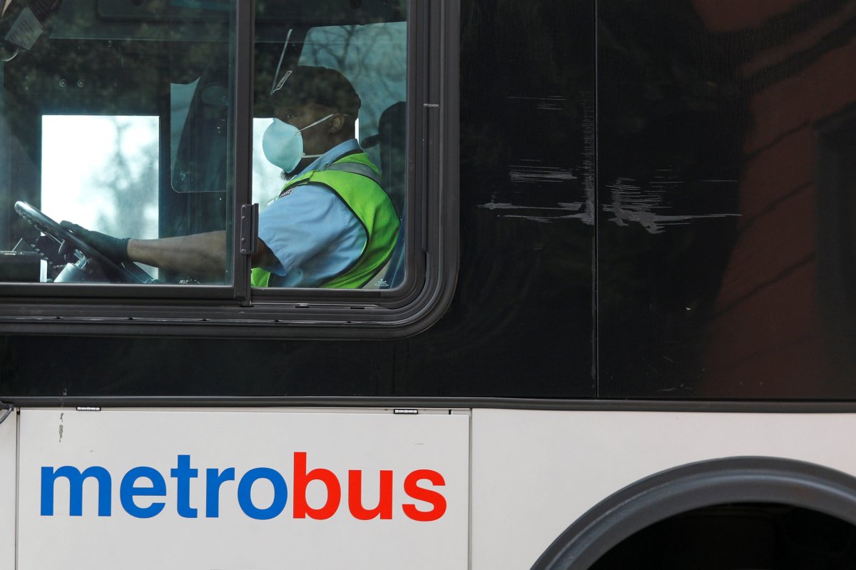 FILE PHOTO: A Washington Metro bus driver passes along a