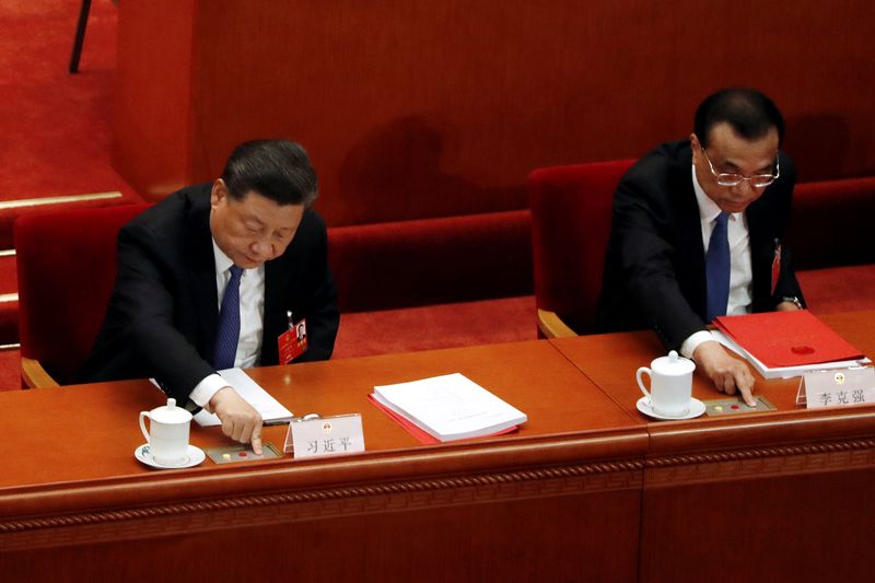 Chinese President Xi Jinping and Premier Li Keqiang cast their