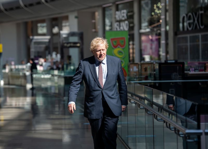 Prime Minister Boris Johnson visits the M&S clothing department and