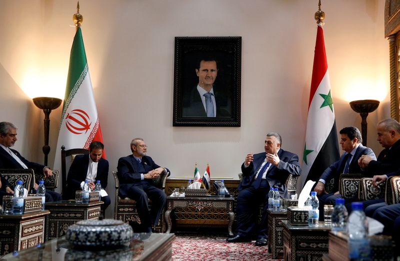 FILE PHOTO: Iranian parliament speaker Ali Larijani meets with Syrian