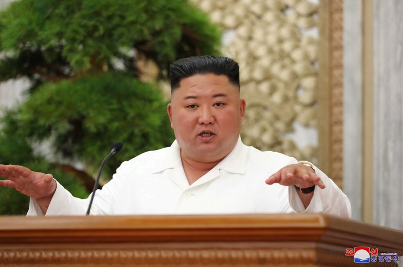 North Korean leader Kim Jong Un guides the 14th enlarged