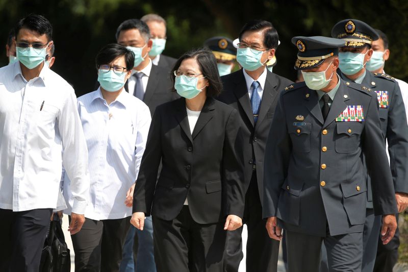 Taiwan’s President Tsai Ing-wen leaves after paying her respects to