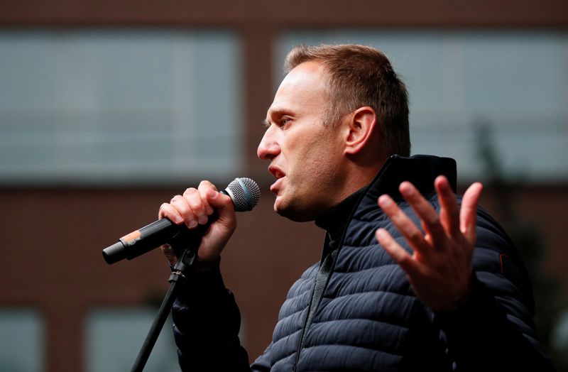 FILE PHOTO: Russian opposition leader Navalny attends a rally to