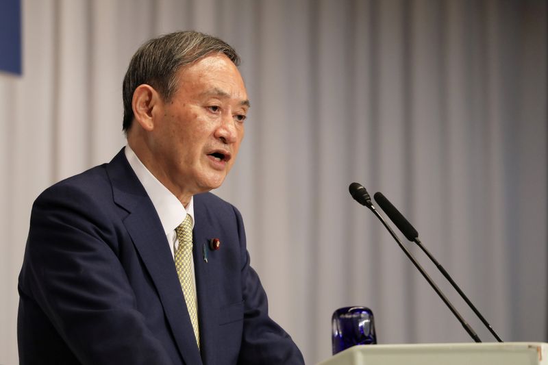 Japanese Chief Cabinet Secretary Yoshihide Suga , former Foreign Minister
