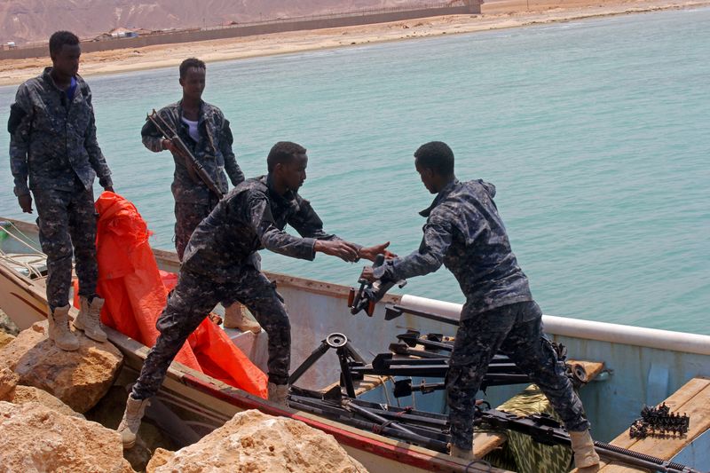 FILE PHOTO: Somali Puntland forces receive weapons seized in a