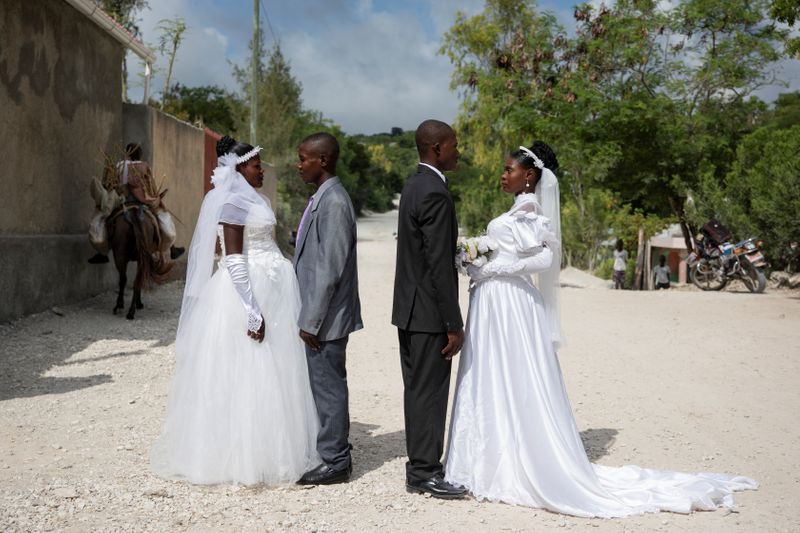 The Wider Image: Haiti’s brides beat hurricanes, power cuts and