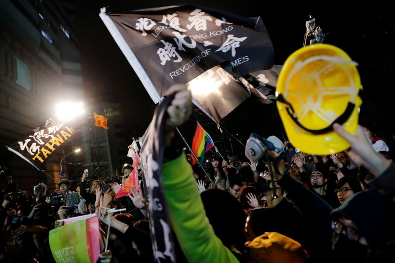 FILE PHOTO: Hong Kong anti-government protesters attend a rally in