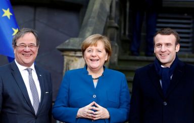 FILE PHOTO: Angela Merkel and Emmanuel Macron sign Treaty of