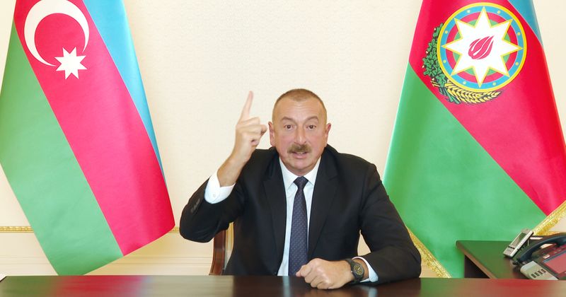 Azerbaijan’s President Ilham Aliyev speaks during an address to the