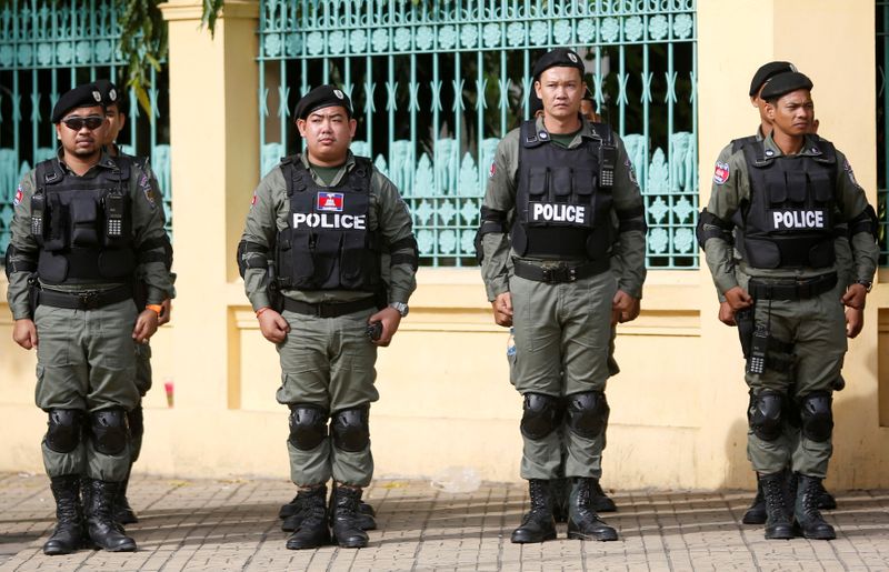 FILE PHOTO: Police officers stand guard near the Supreme Court