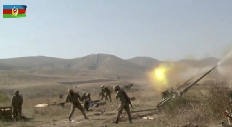 A still image shows Azeri artillery performing strikes during a
