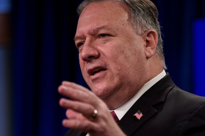 FILE PHOTO: U.S. Secretary of State Mike Pompeo holds a