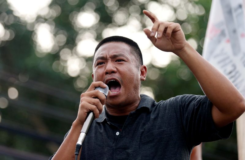 Pro-democracy protester Jatupat “Pai” Boonpattararaksa gives a speech after being