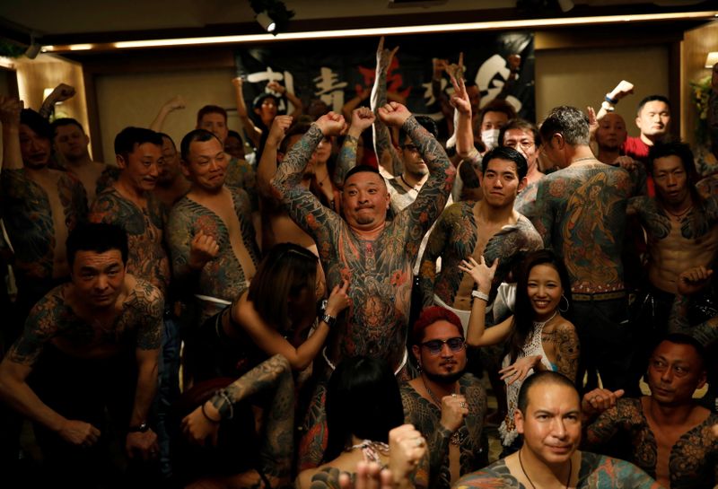 The Wider Image: Breaking taboos: Japan’s tattoo fans bare their
