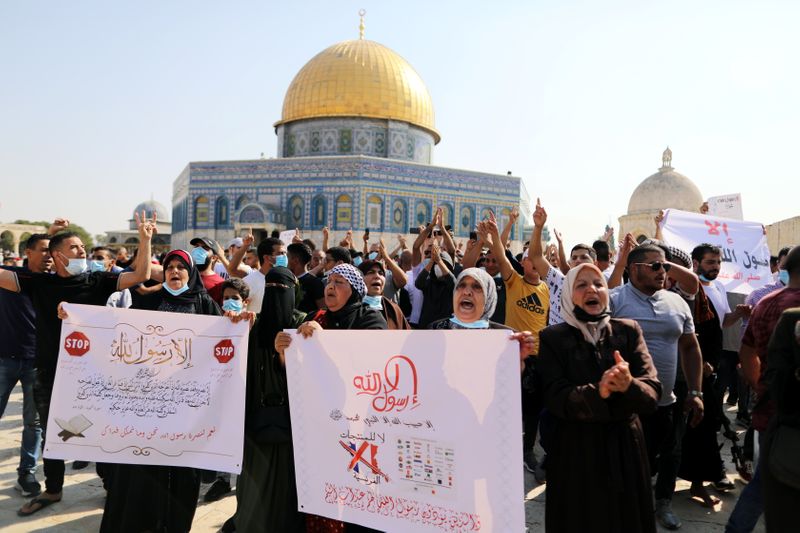 Palestinians protest over Prophet Mohammad cartoon, after Friday prayers in