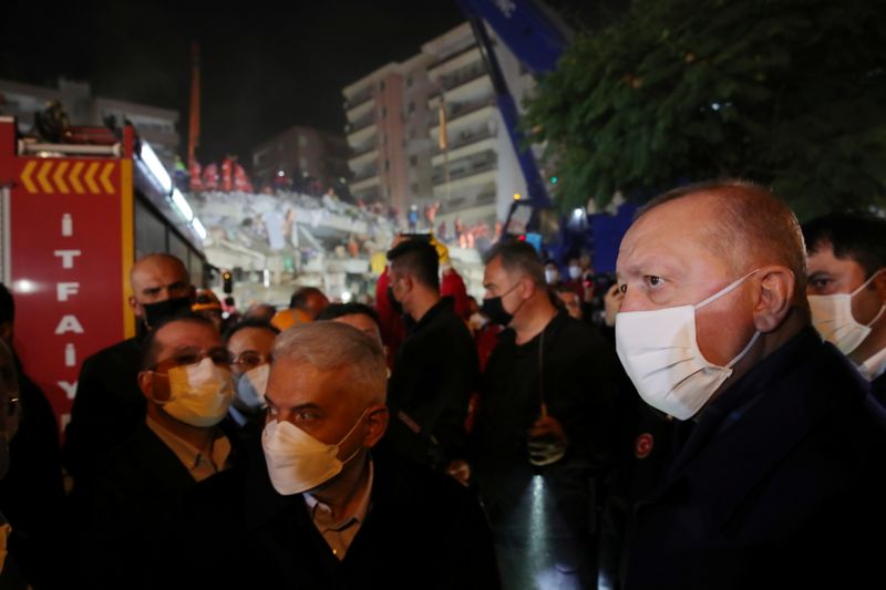 Turkish President Erdogan visits a site of a collapsed building