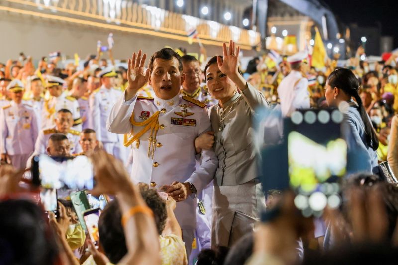 Thailand’s King Maha Vajiralongkorn and Queen Suthida greet royalists, at
