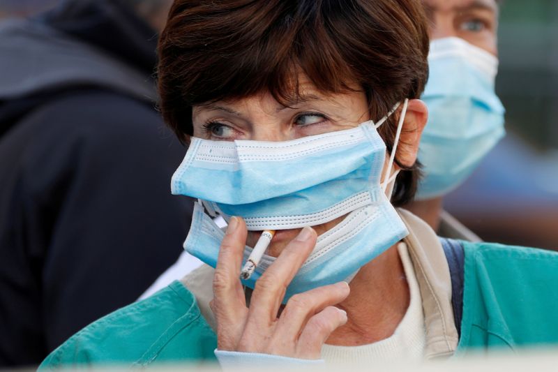 FILE PHOTO: Health workers demonstrate in Nice