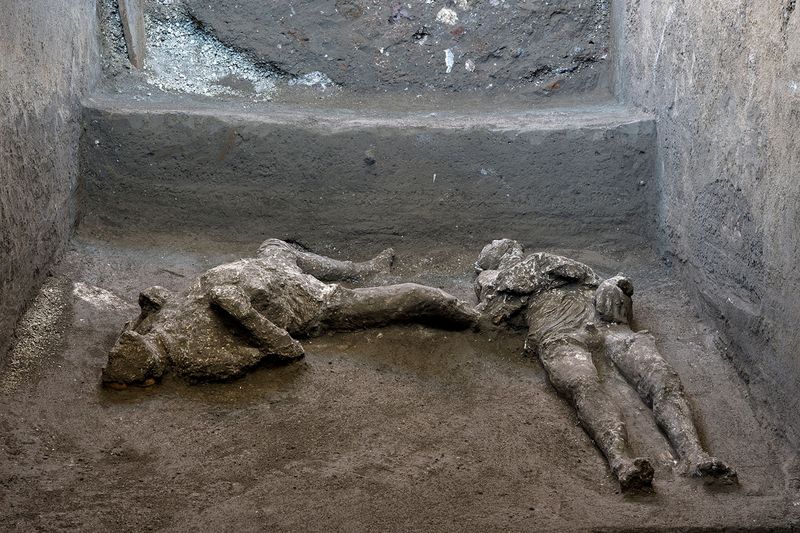Remains of two men who died in the volcanic eruption