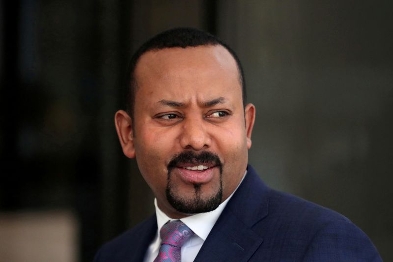 FILE PHOTO: Ethiopia’s PM Ahmed waits for the arrival of