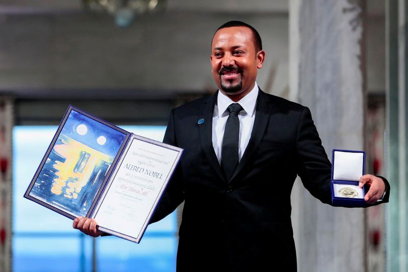 FILE PHOTO: Ethiopian Prime Minister Abiy Ahmed Ali poses with