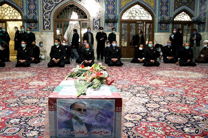 A coffin with an image of Iranian nuclear scientist Mohsen