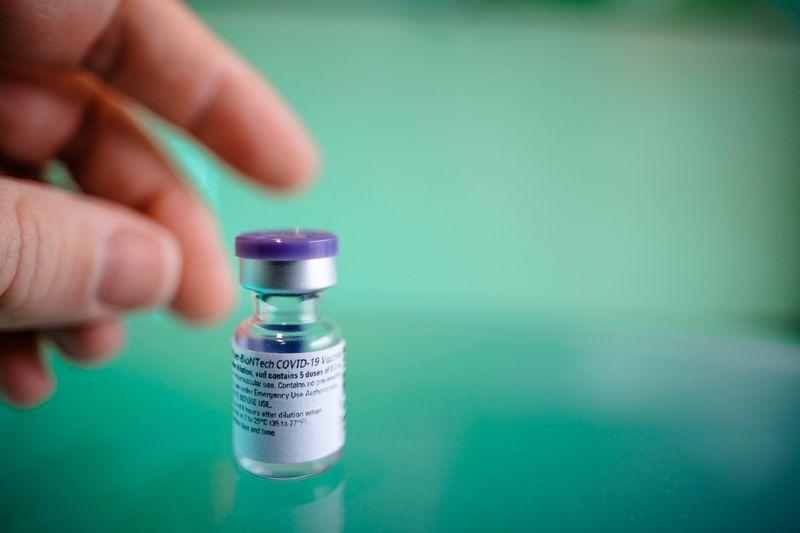 FILE PHOTO: Dose of the COVID-19 vaccination of BioNTech and
