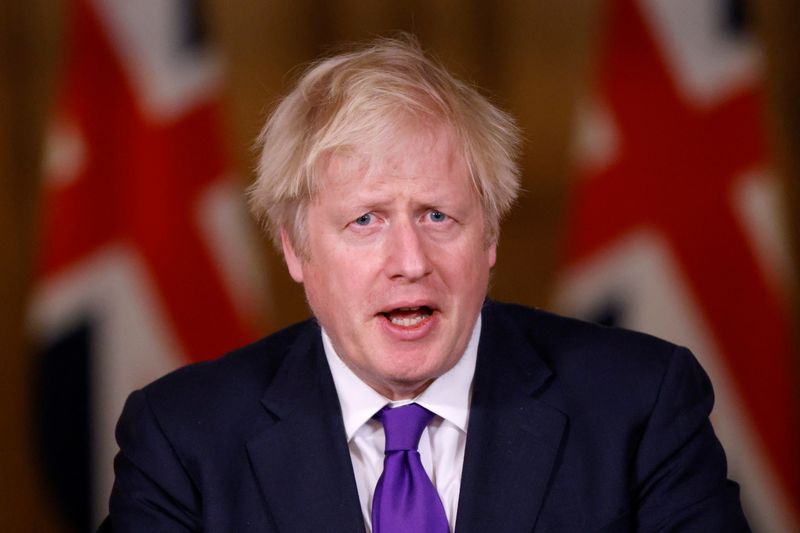 FILE PHOTO: Britain’s PM Johnson attends a news conference in
