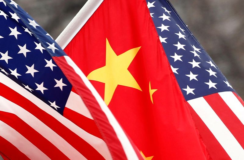 FILE PHOTO: Chinese and U.S. flags fly along Pennsylvania Avenue