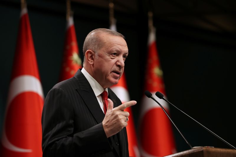 Turkish President Erdogan talks during a news conference in Ankara