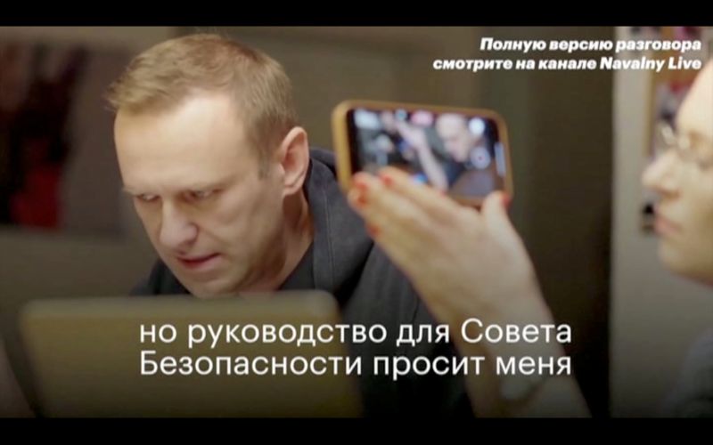 Russian opposition politician Alexei Navalny is seen during a phone