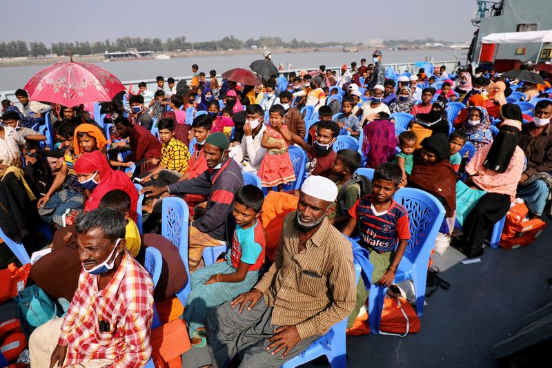 FILE PHOTO: Rohingya refugees are seen aboard a ship as