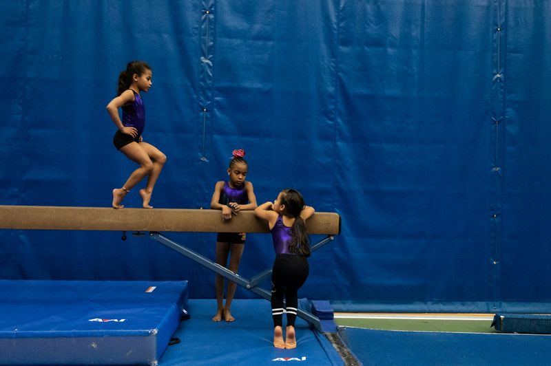 The Wider Image: In Simone Biles’ path, a fearless young