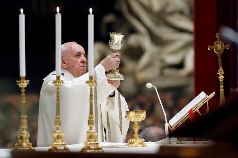 Pope Francis leads an Easter vigil service with no public