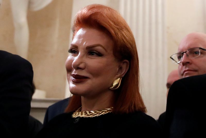 U.S. Ambassador to Poland Mosbacher watches news conference in Warsaw