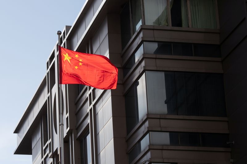 China’s national flag is seen waving at the China Consulate