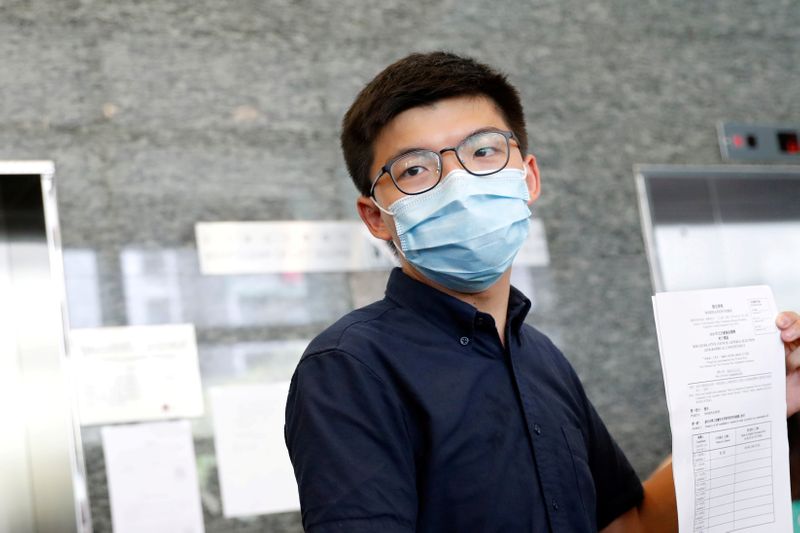 FILE PHOTO: Pro-democracy activist Joshua Wong registers as a candidate
