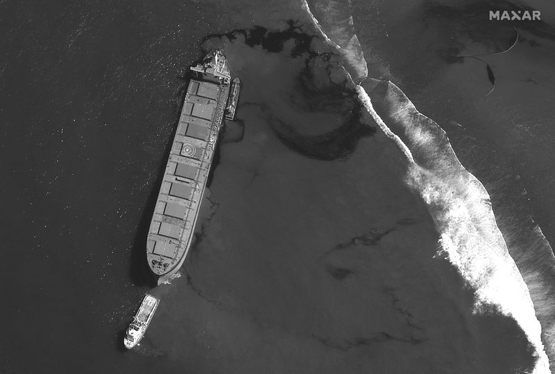 A satellite image shows the MV Wakashio ship and the