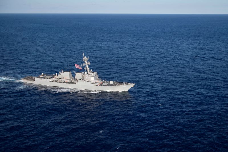 The U.S. Navy Arleigh Burke-class guided-missile destroyer USS Stockdale transits