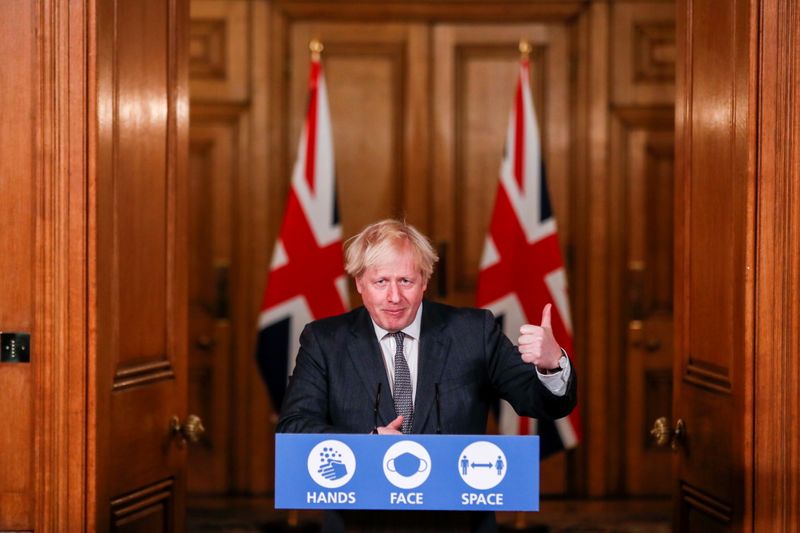 Britain’s PM Johnson holds a news conference at Downing Street