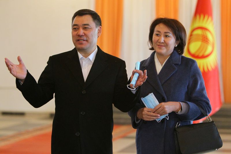 Presidential candidate Sadyr Japarov and his wife Aigul pose for