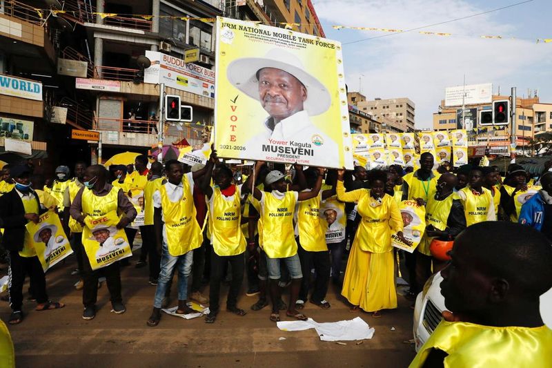 Polling agents from the National Resistance Movement (NRM) party celebrate