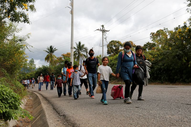 Hondurans take part in a new caravan of migrants set
