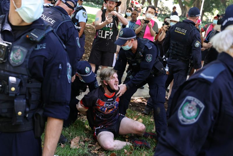 A person is arrested by police during an Australia Day